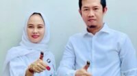 Trisal dan istrinya